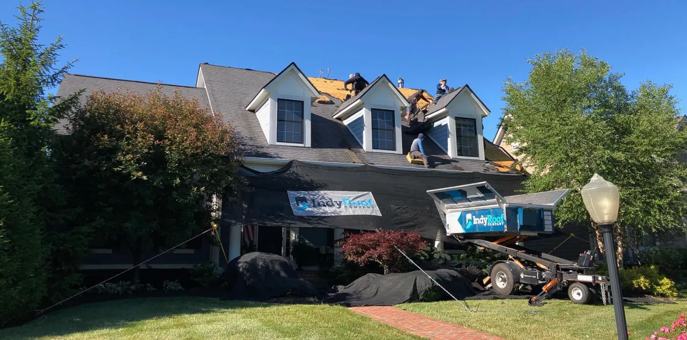 Tarping and dry-in on a Fountain City commercial roof